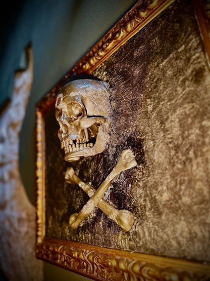 Teschio con moneta del XV secolo